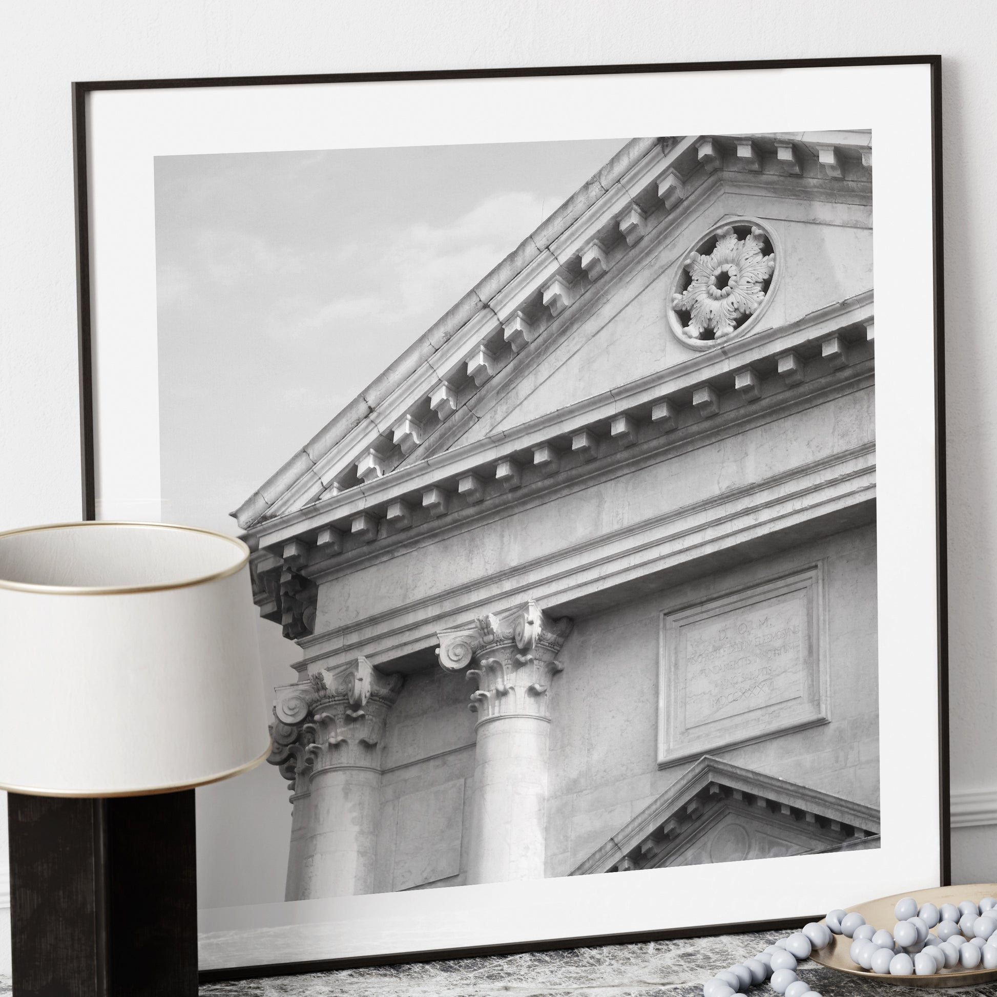 Monumental, classic architectural corner of Venice, black and white photography art print on a marble sideboard.