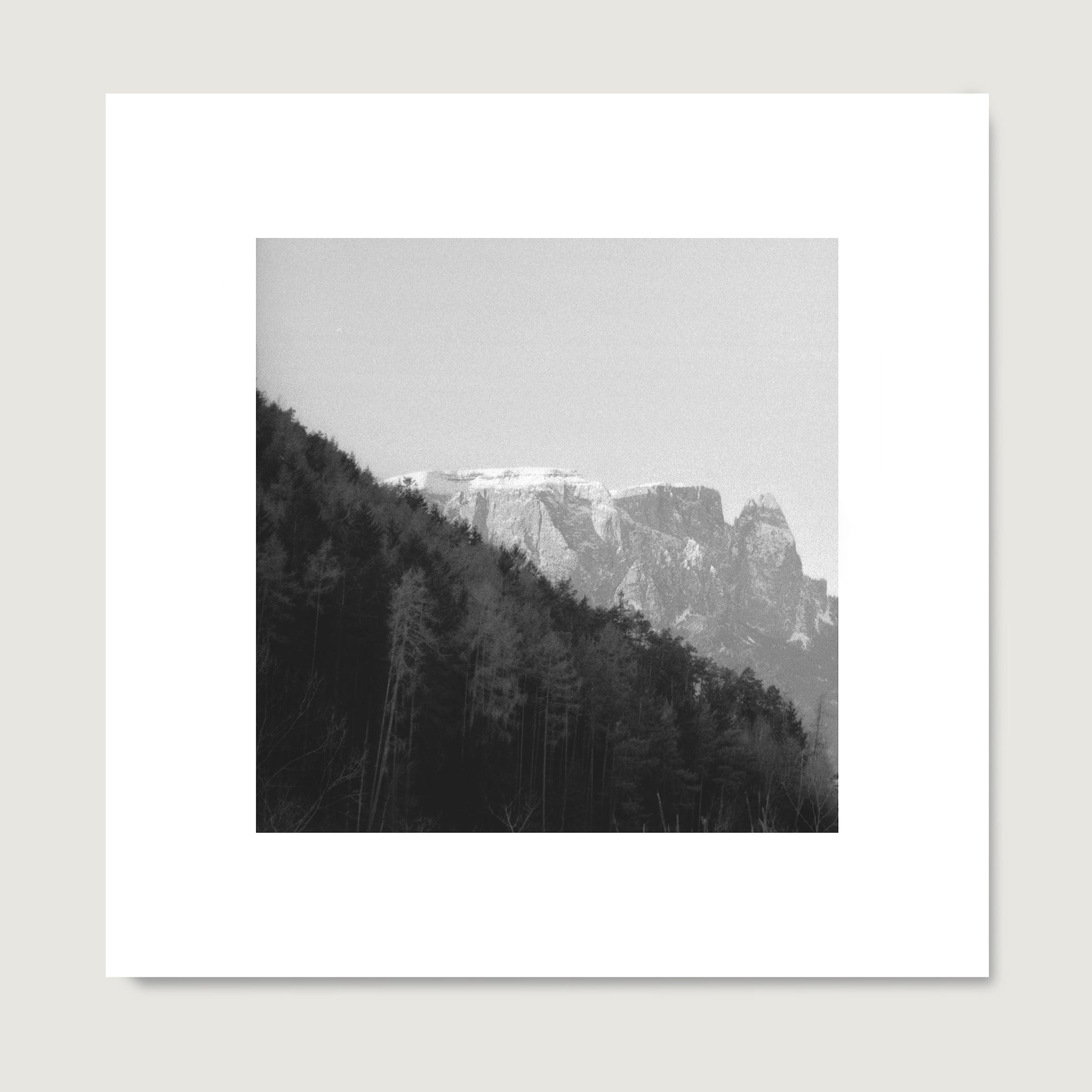 Moody mountains landscape photography, black and white art print on paper.