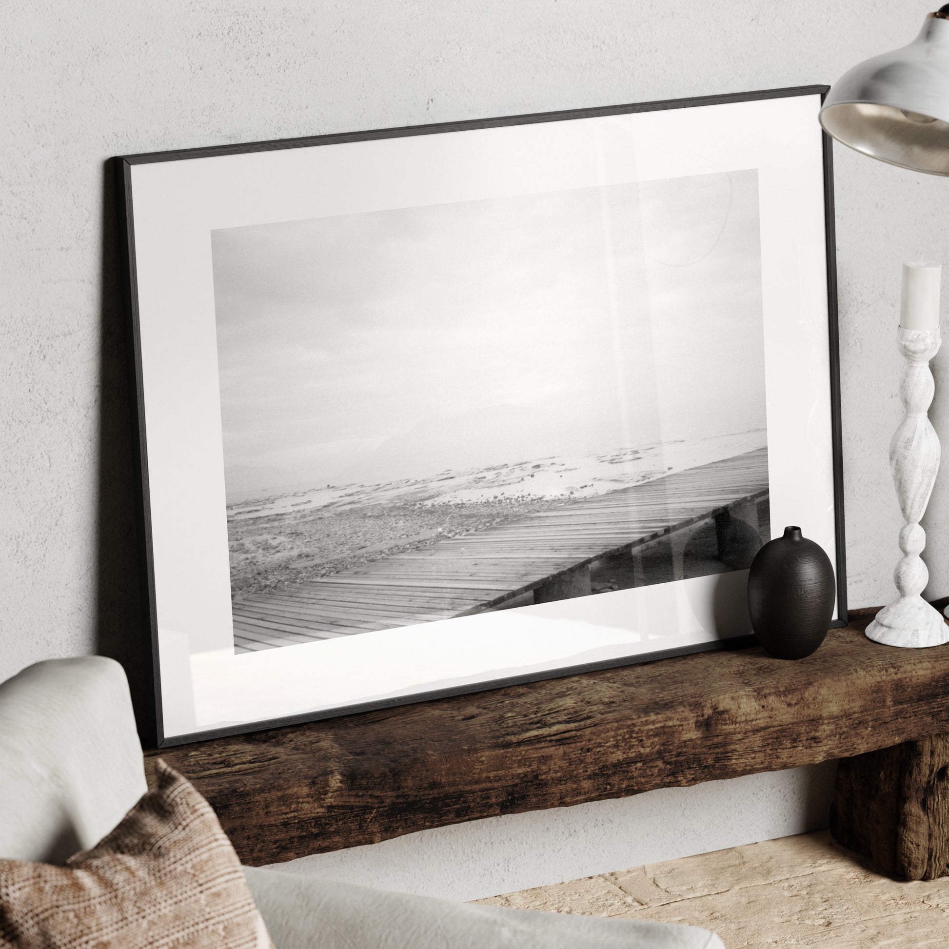 Moody Lake Garda black and white photography art print in a metallic frame.