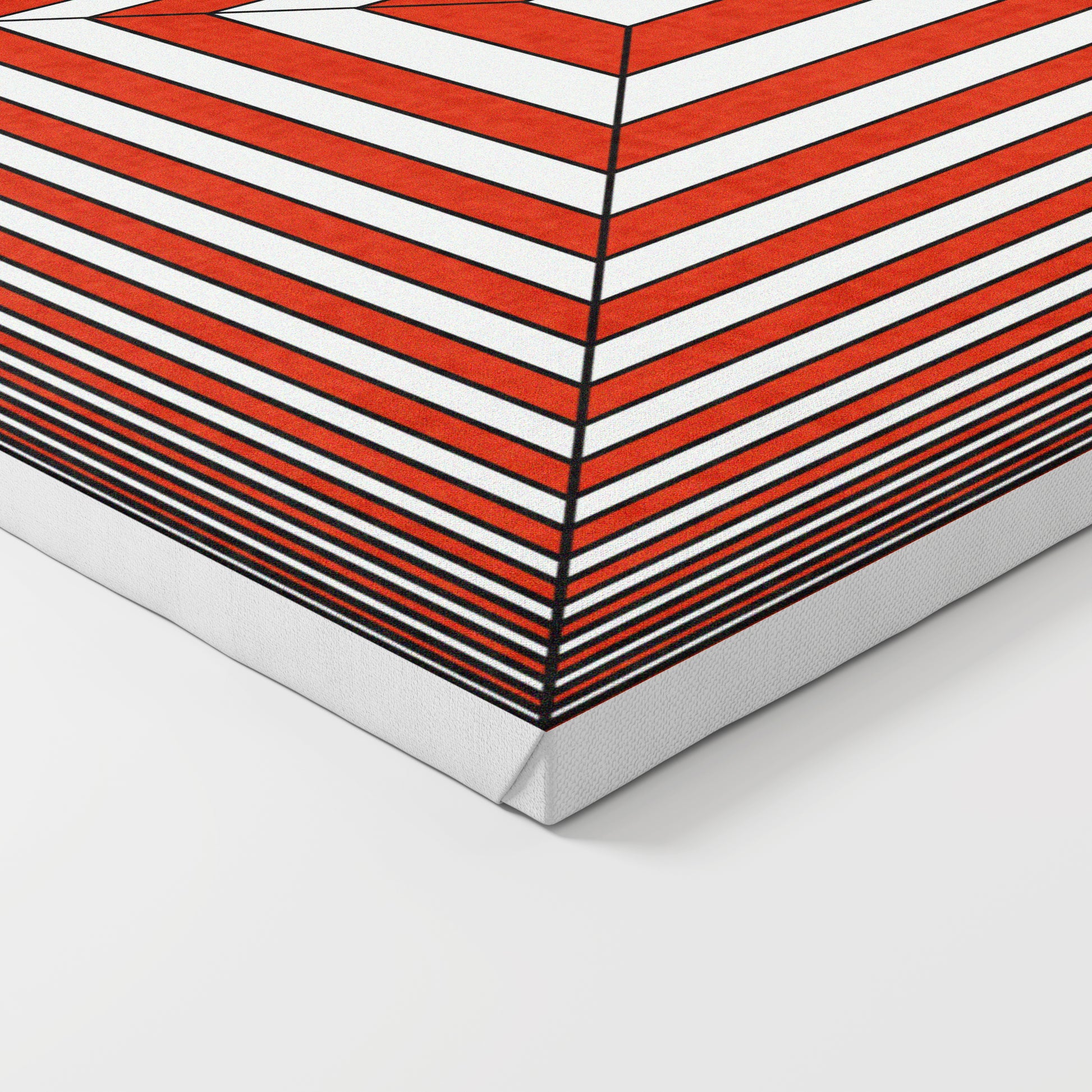 Red and white geometric abstract graphic art print on canvas.