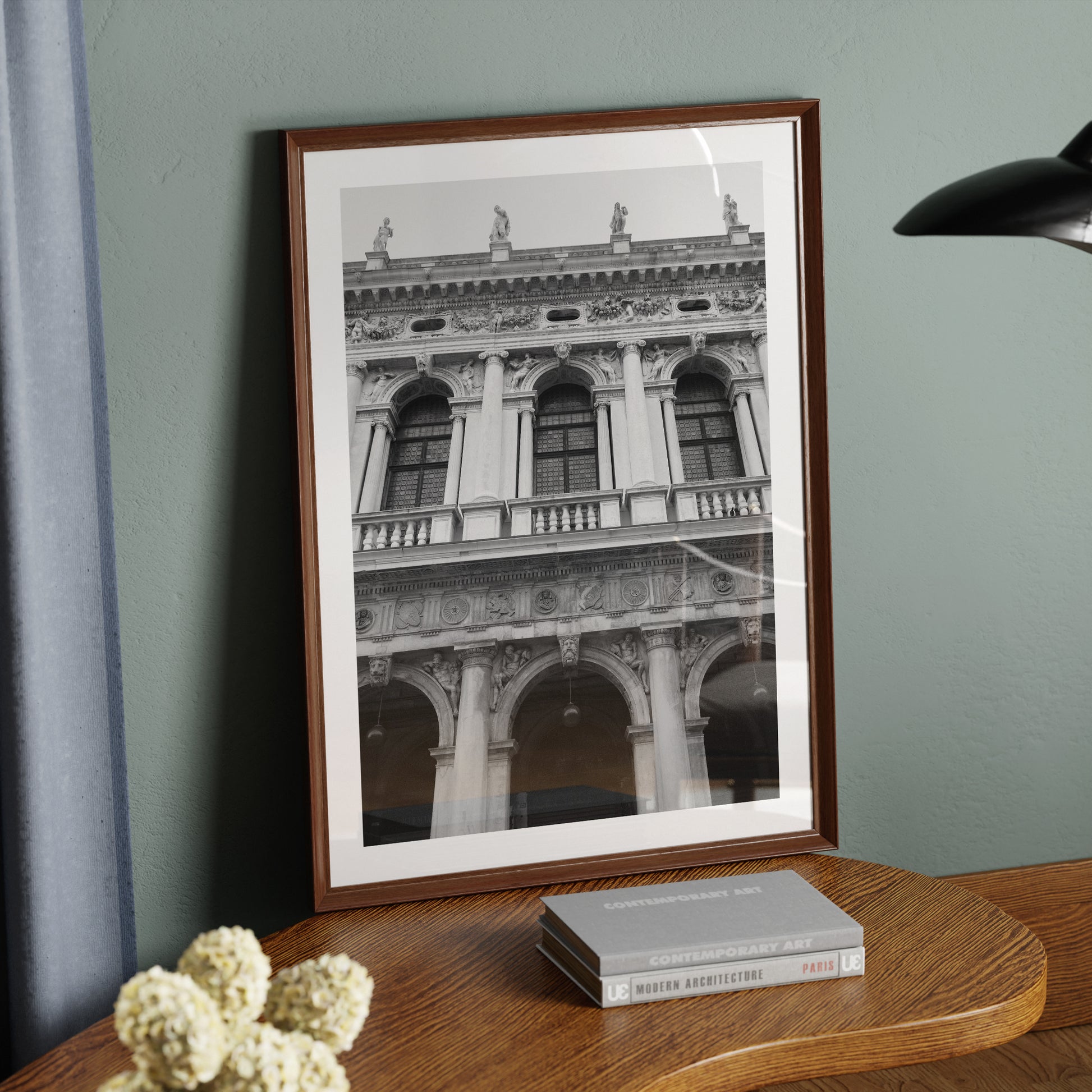 Old Venice building facade, black and white artistic photography art print on a wood table.