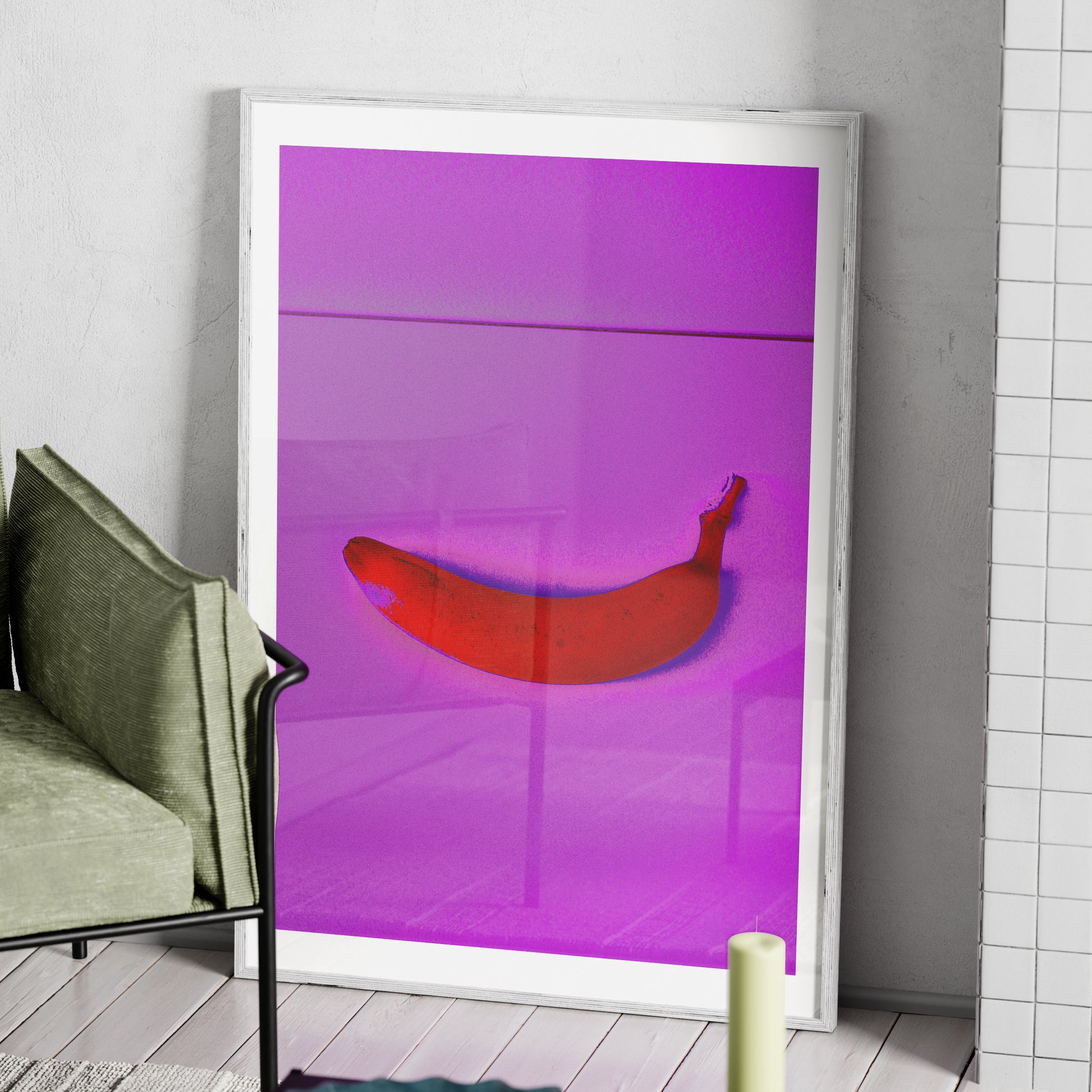 Pink banana minimalist pop art art print in a white wood frame.
