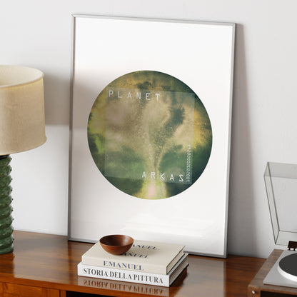 Green planet minimalist watercolor graphic art print on a vintage wood sideboard.