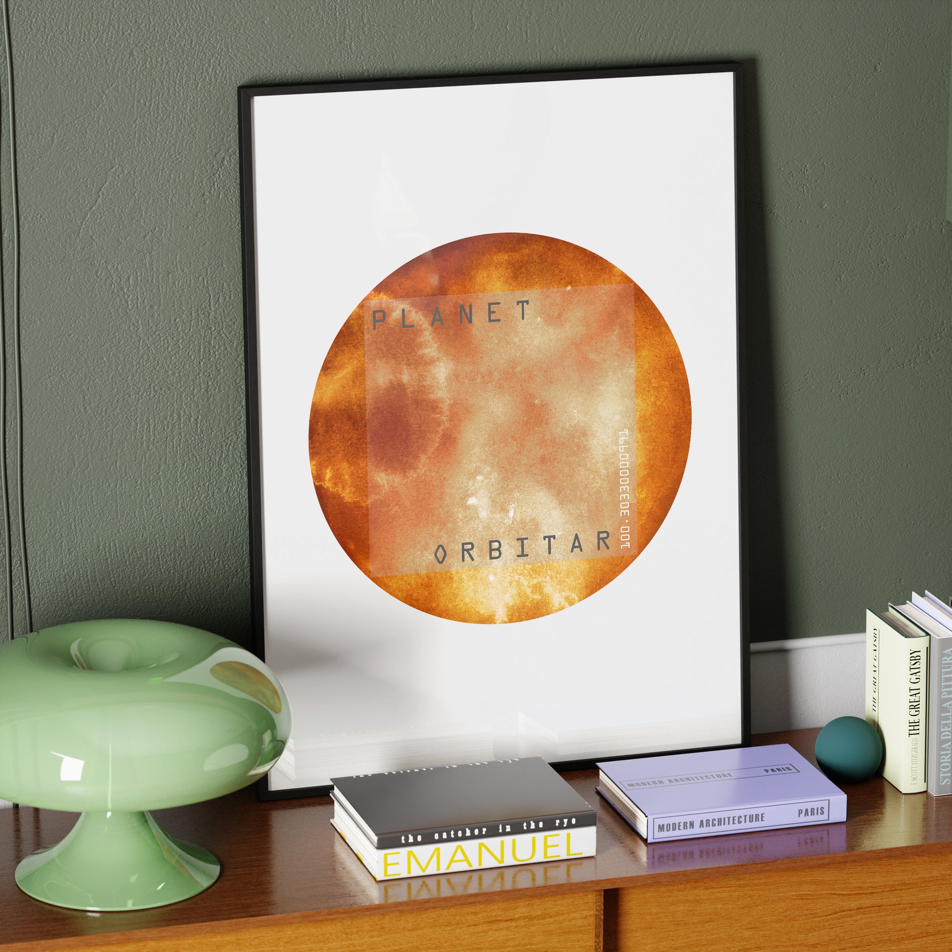 Red planet, minimalist watercolor graphic art print on a vintage wood sideboard.