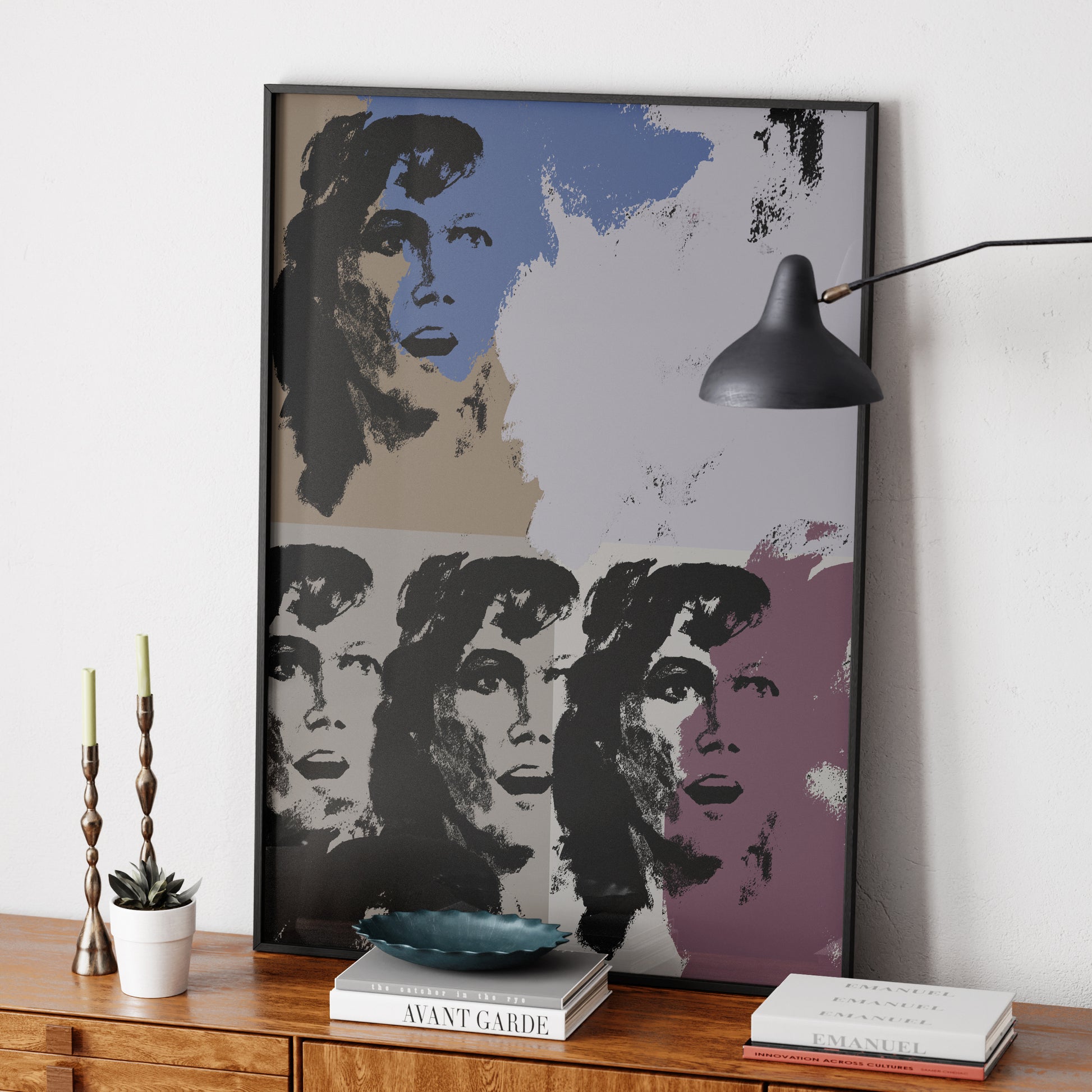 Pop art art print on a mid-century-modern sideboard.
