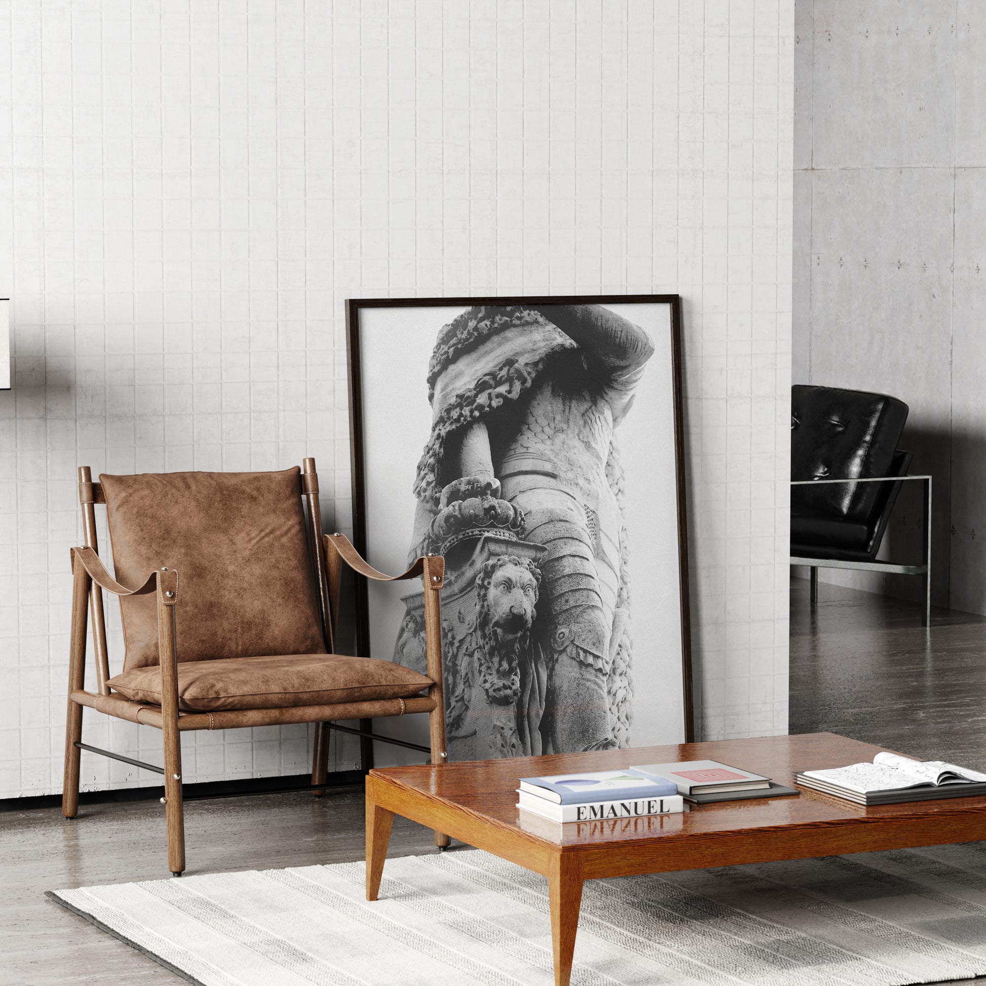 Living room with brown chair, wooden coffee table, and framed black and white photography art print.