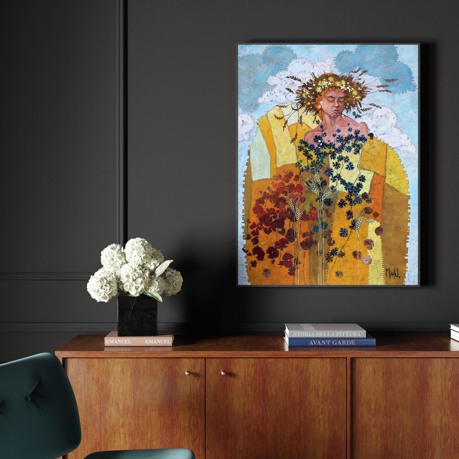Artistic figurative painting with a woman figure, flowers and warm colors, above a wood sideboard.