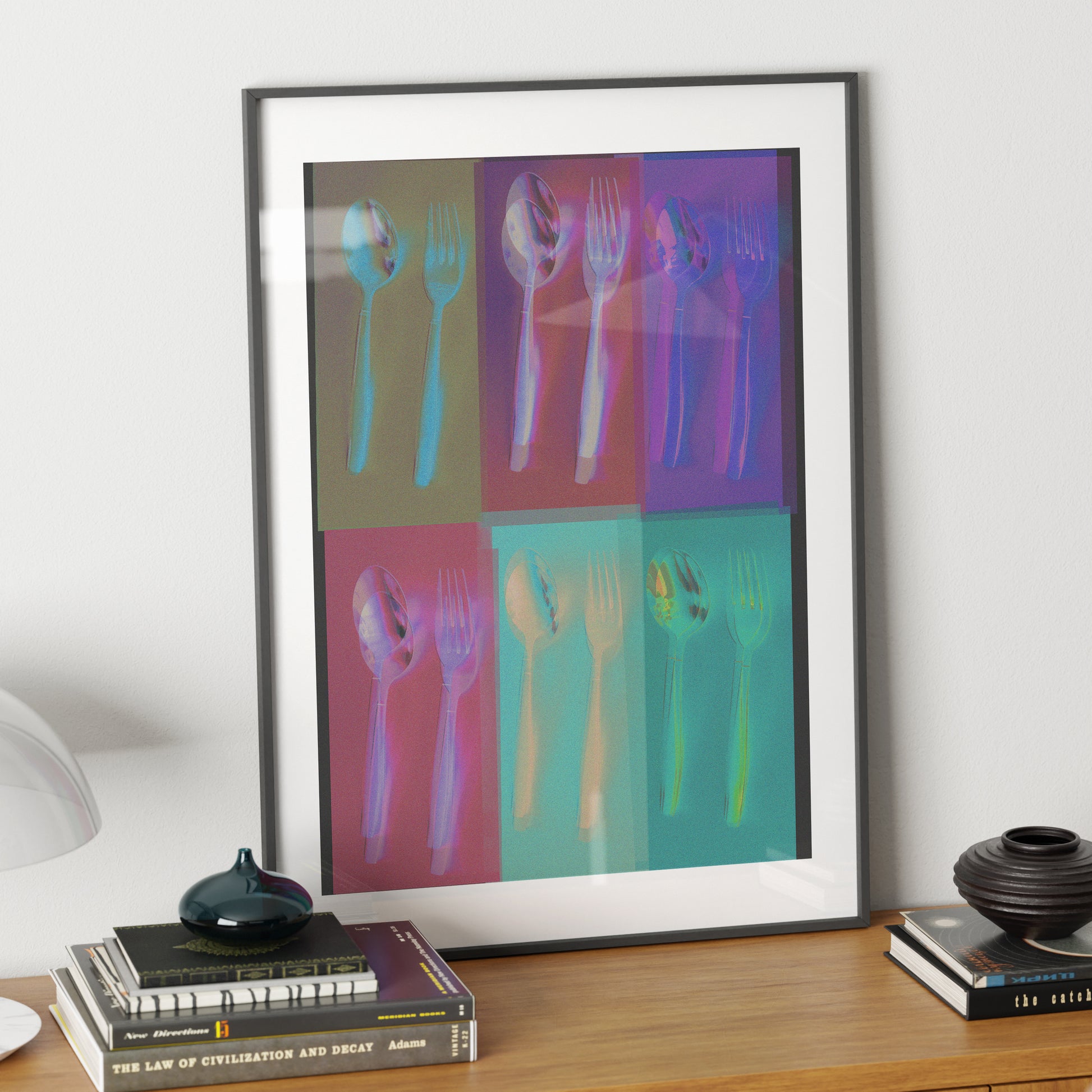 Silverware repetition colorful pop art art print on a sideboard.