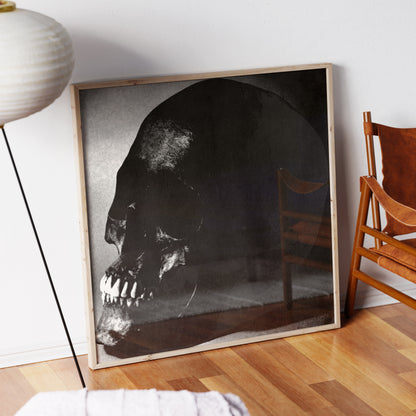 Black and white skull pop art art print in a wood frame.