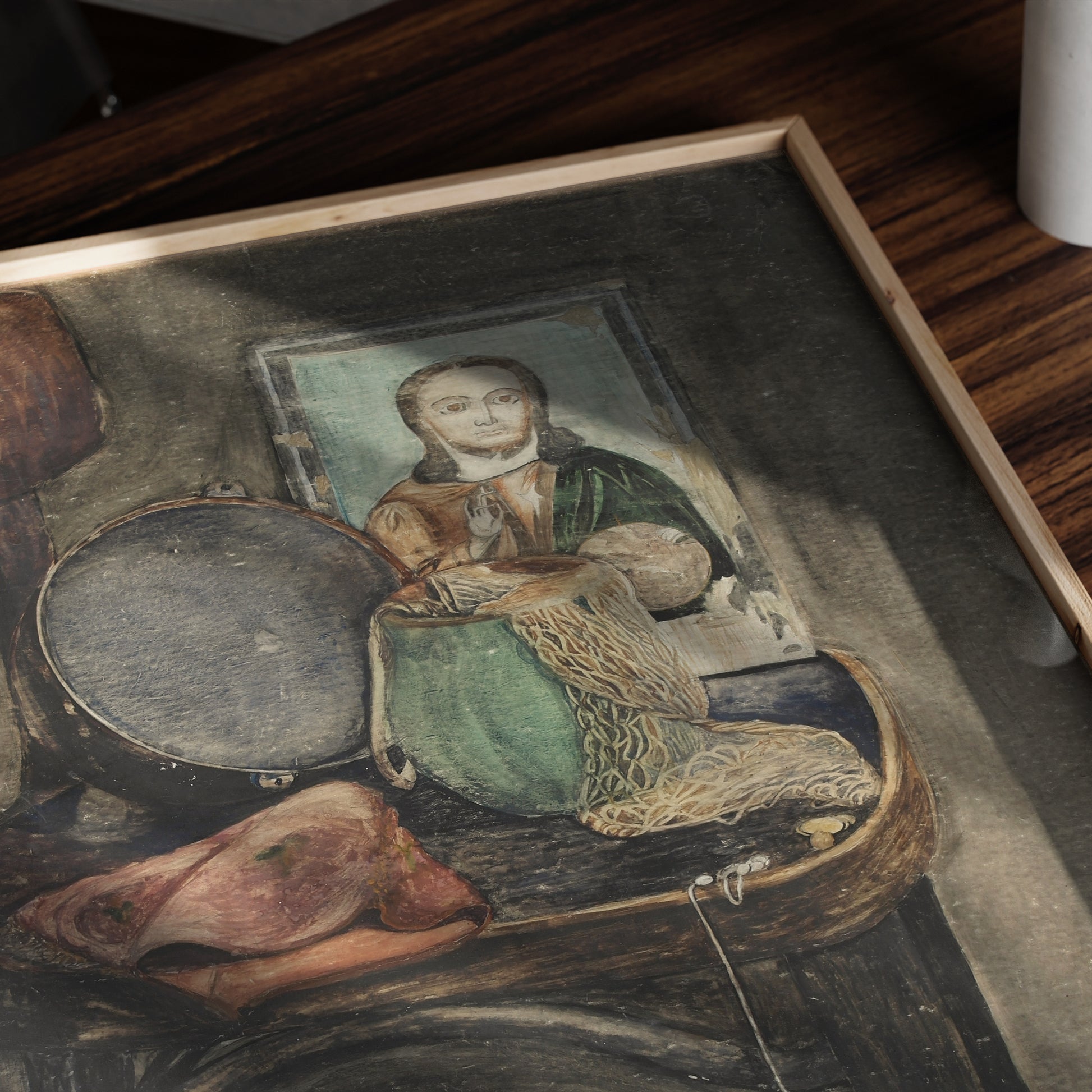 Detail of a figurative framed art print with vintage wooden chair, orthodox icon and various other objects.