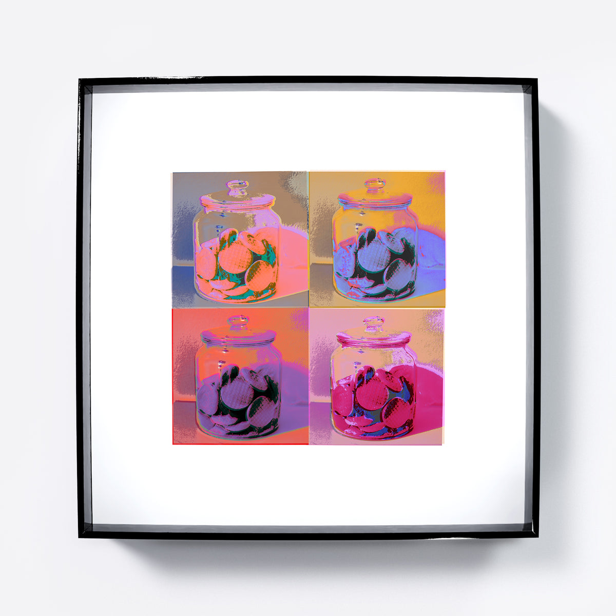 Framed artwork of a four-panel design with jars full of cookies on a white background.