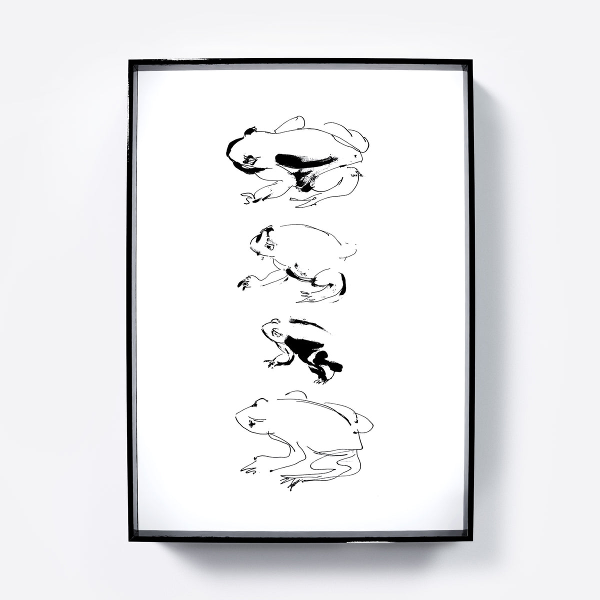 Framed art print of an ink frog study on a white background.