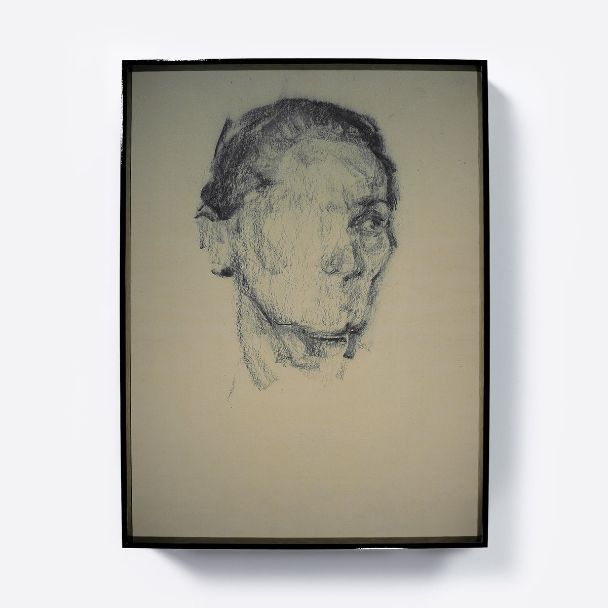 Framed figurative art print of a unfinished head study on neutral background.