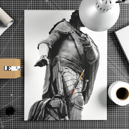 Black and white photography art print with a statue of a person in armor on a white background.