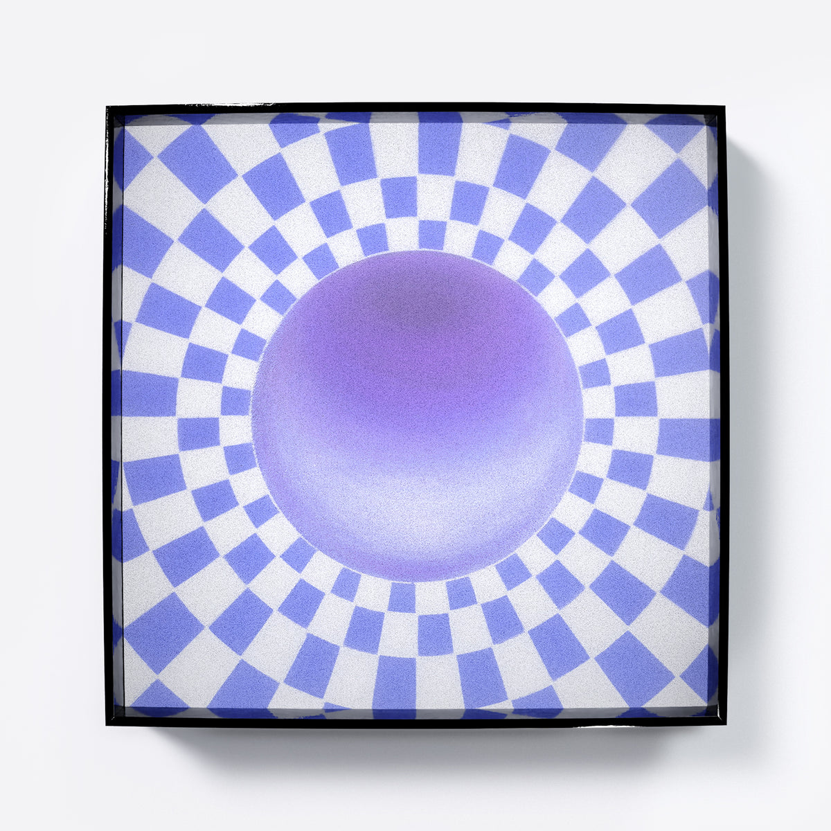 Framed artwork with a purple circle and blue and white checkered pattern.
