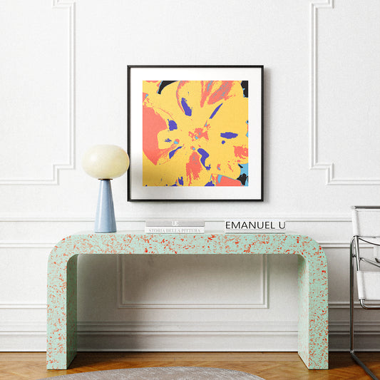 Modern interior with a colorful abstract painting above a speckled console table.