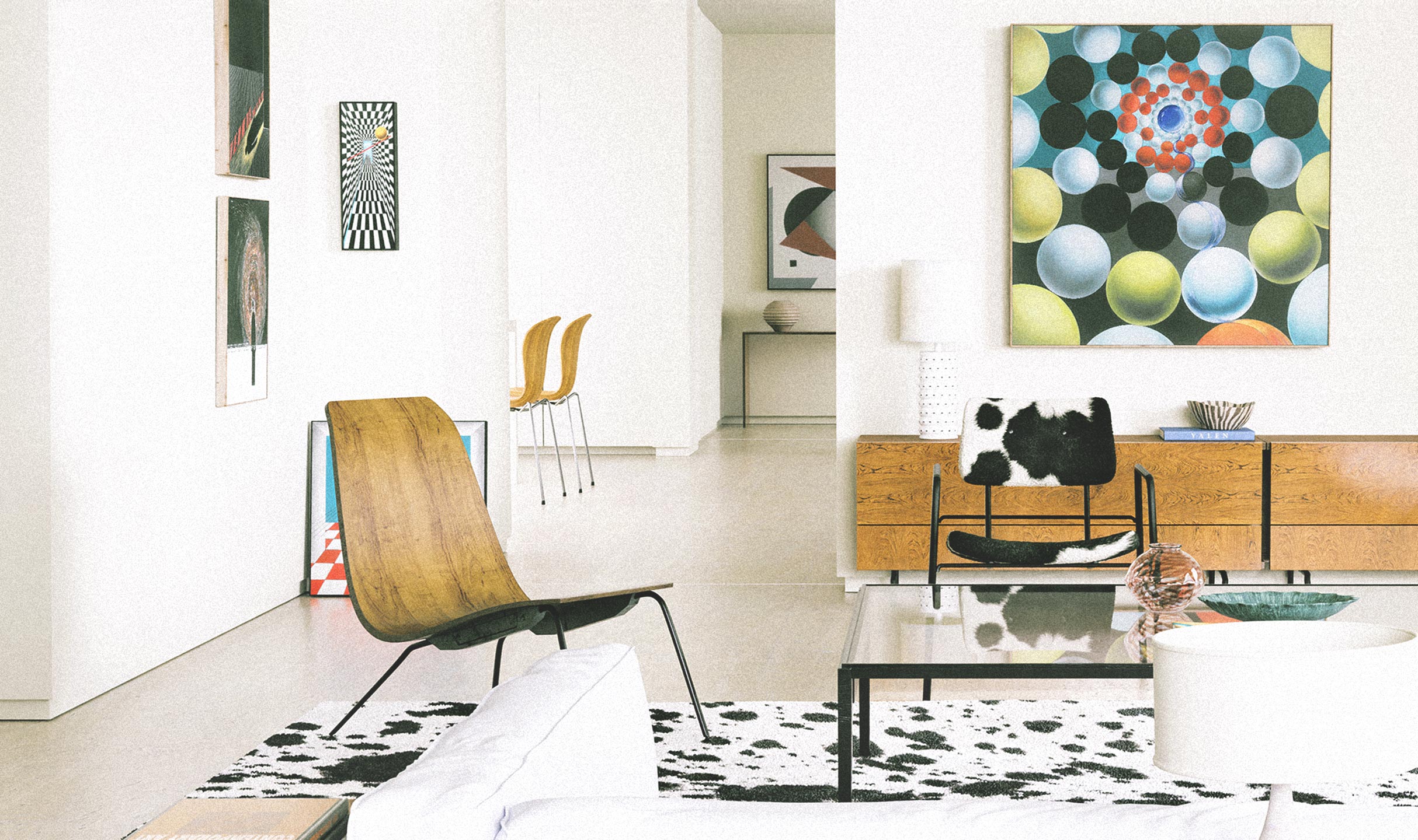 Modern living room interior featuring multiple framed original artworks from the Originals collection.