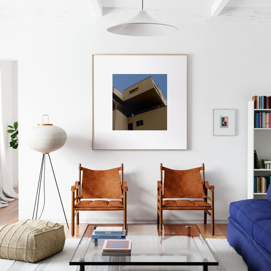 Brutalist, modern architectural corner in Vienna, urban photography art print in a bright living room.